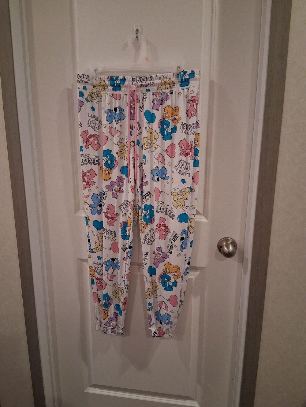 Care Bears White Pajama Pants with Blue Pink Yellow and Purple Characters Size L